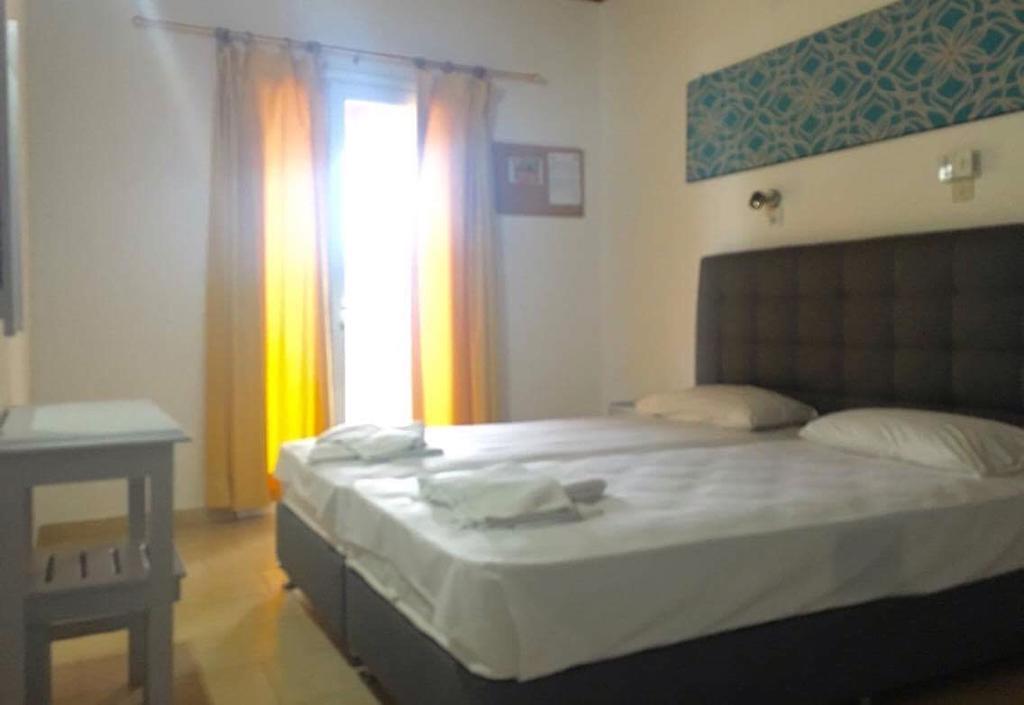Athina Aparthotel Kávos Екстериор снимка